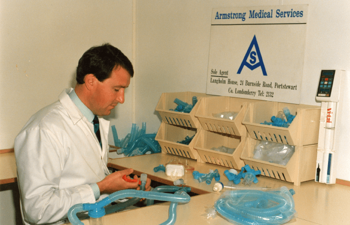 Picture of Armstrong Medical founder in the production facility in the early days