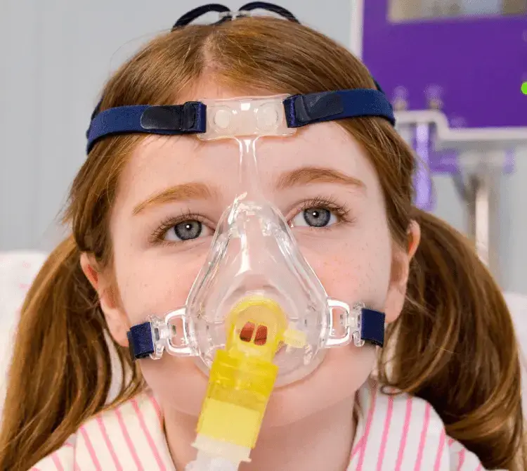 Child wearing a paediatric NIV Face Mask